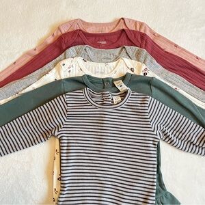 Kate Quinn Kids Bodysuits in Pink, Cream, Green, and Gray